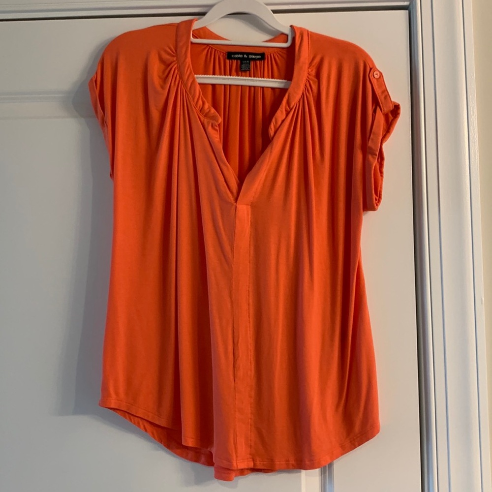 Cable and Gauge blouse, orange in color